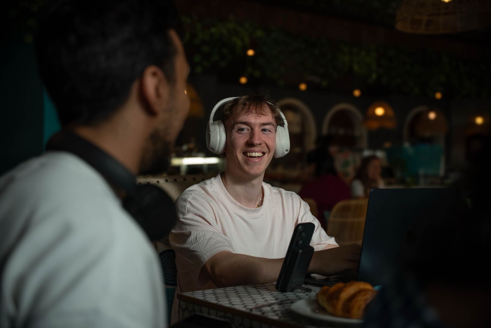 Tom smiling over coffee